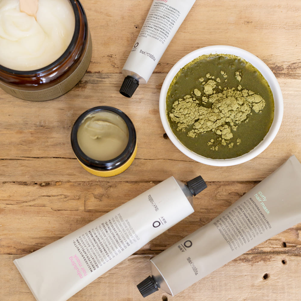 Noosa Headz natural hair products arranged on a wooden surface
